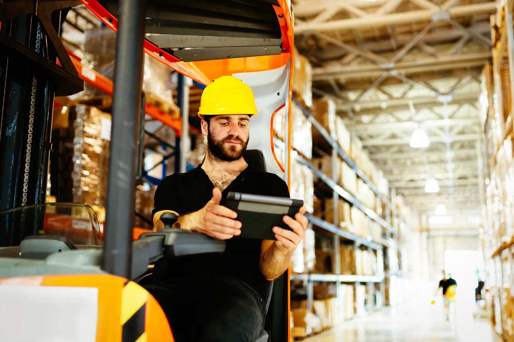Man studying the Benefits of the IoT in Supply Chain Management