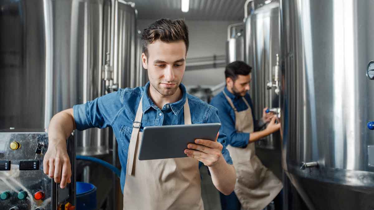 Industry worker learning about the benefits of Internet of Things