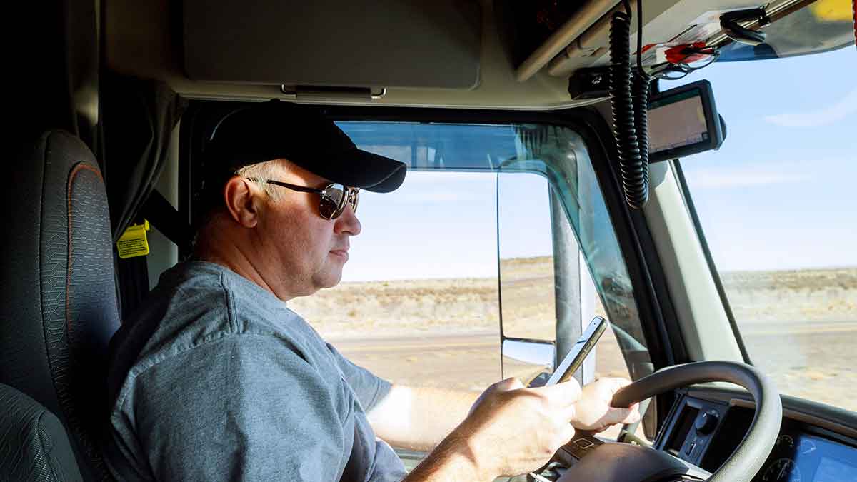Truck driver sending real-time location with IoT technology